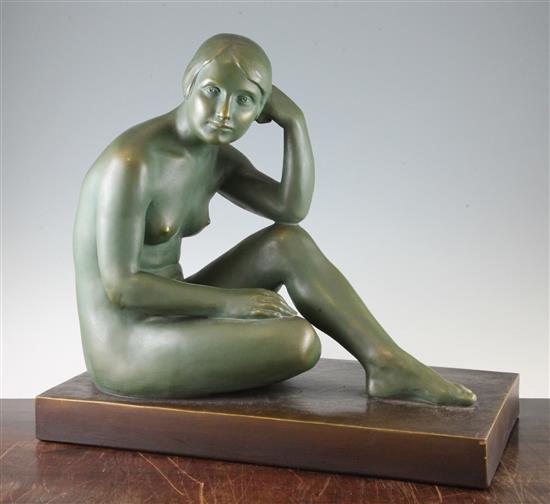 A French Art Deco painted terracotta model of a seated female nude, 18.5in.